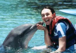 Larah with dolphin